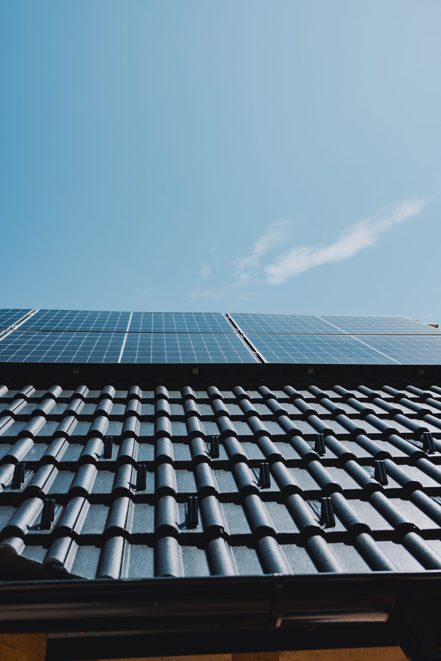 Solar panels generating renewable energy on a modern roof